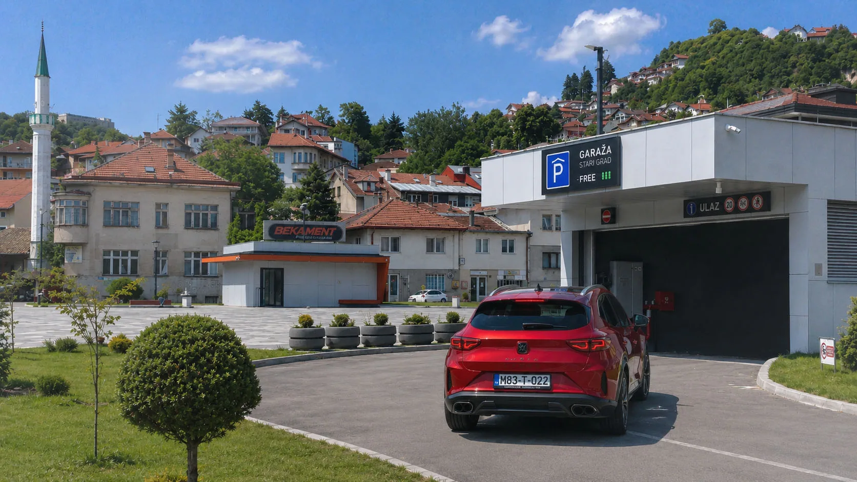 Crveni iznajmljeni SUV ulazi u garažu Stari Grad iznad Baščaršije u Sarajevu